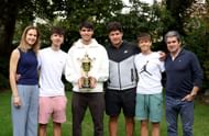 Alcaraz with his parents and brothers at the official Champion's Photocall - Wimbledon 2024 (Image Source: Getty)